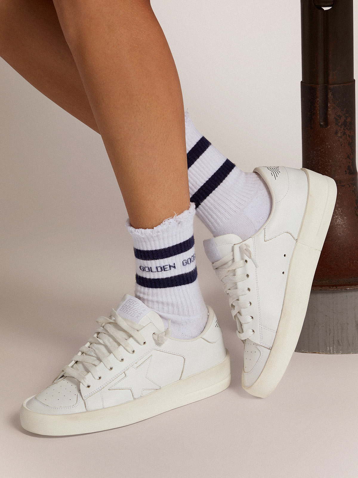 Cotton socks with distressed finishes, blue stripes and logo