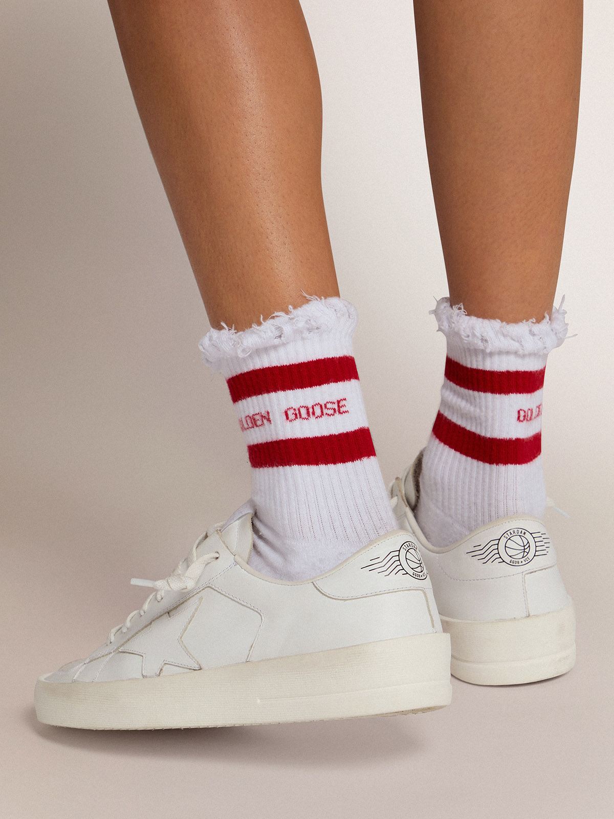 Cotton socks with distressed finishes, red stripes and logo