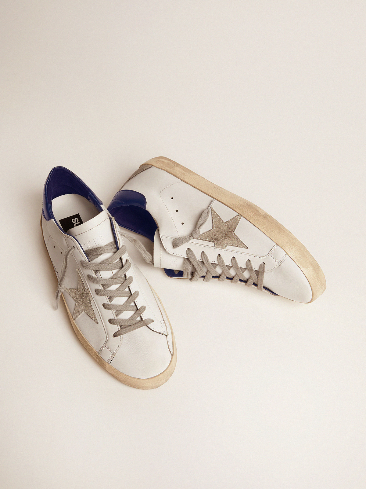Men's Super-Star sneakers with suede star and blue heel tab 
