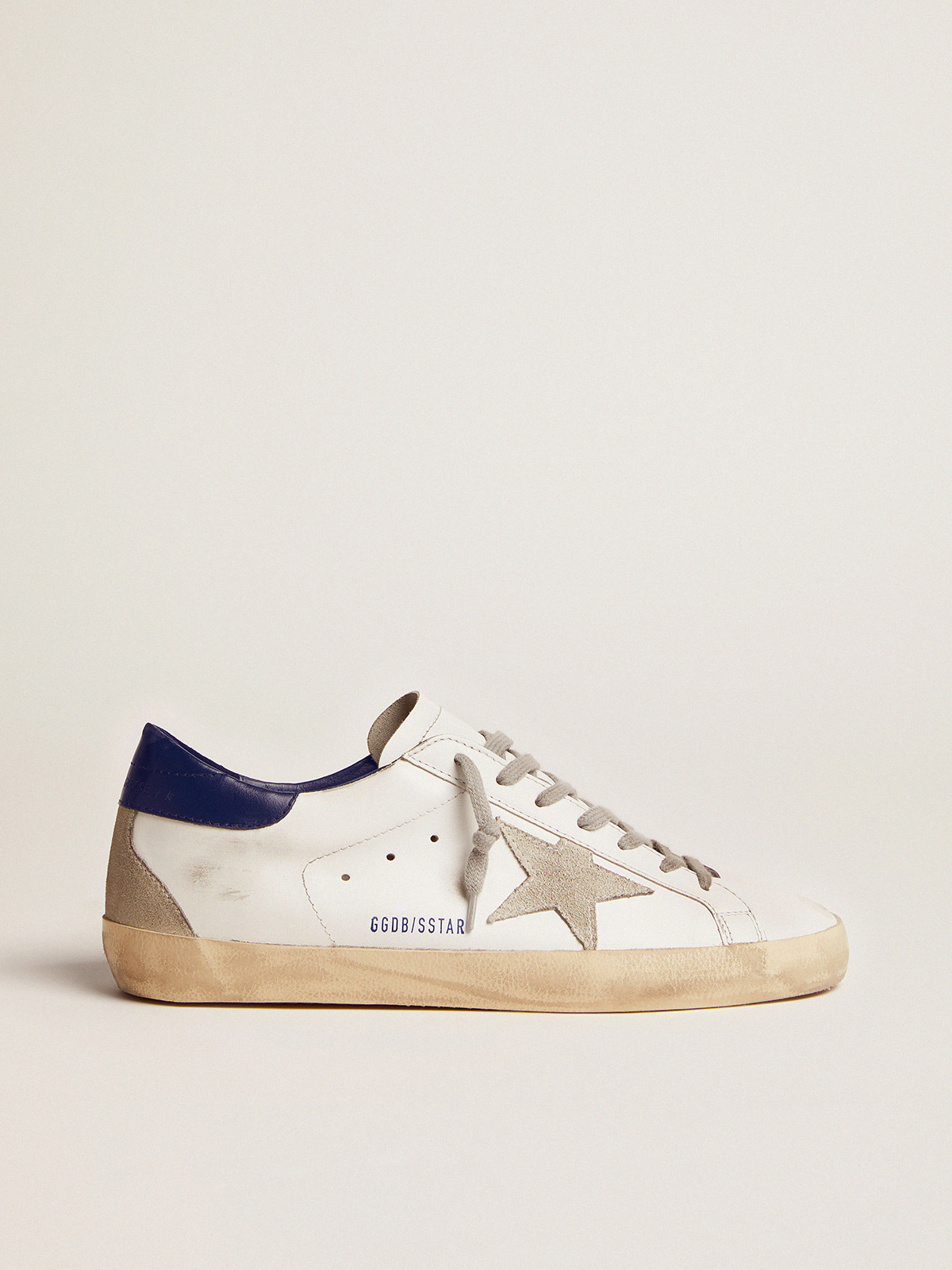 White trainers best sale with gold stars