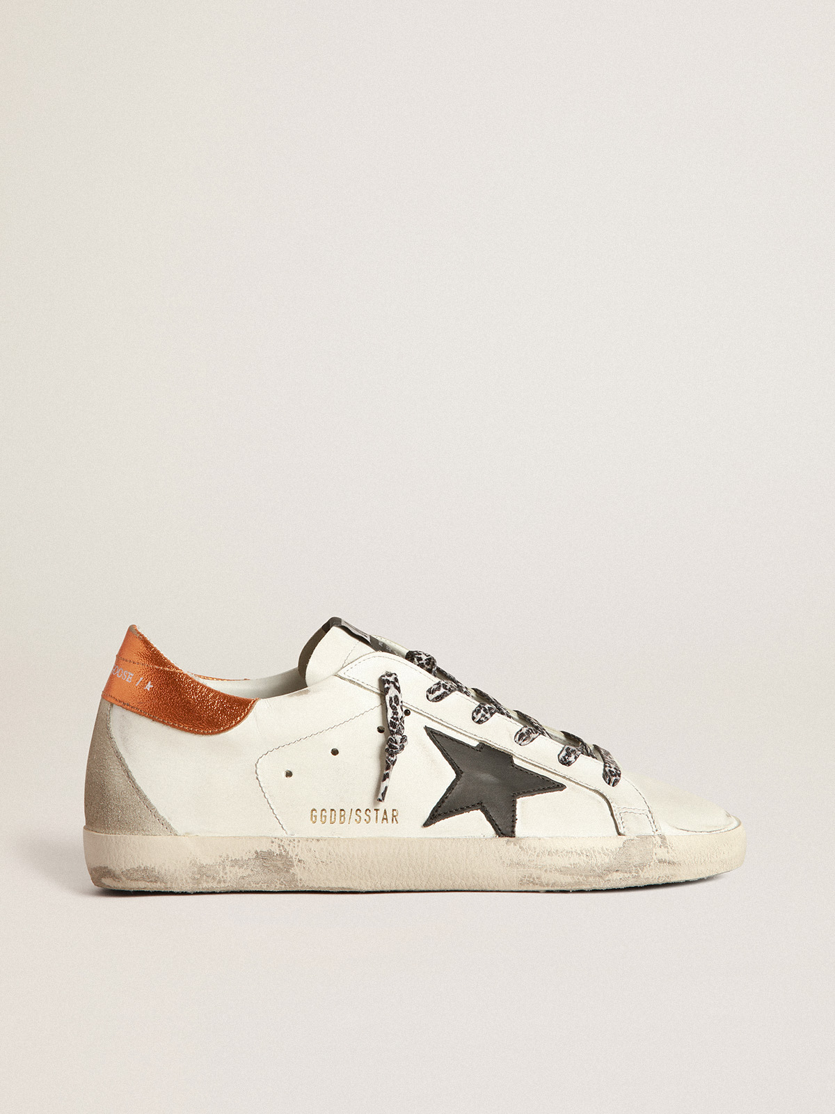 Golden goose black and best sale white sneakers