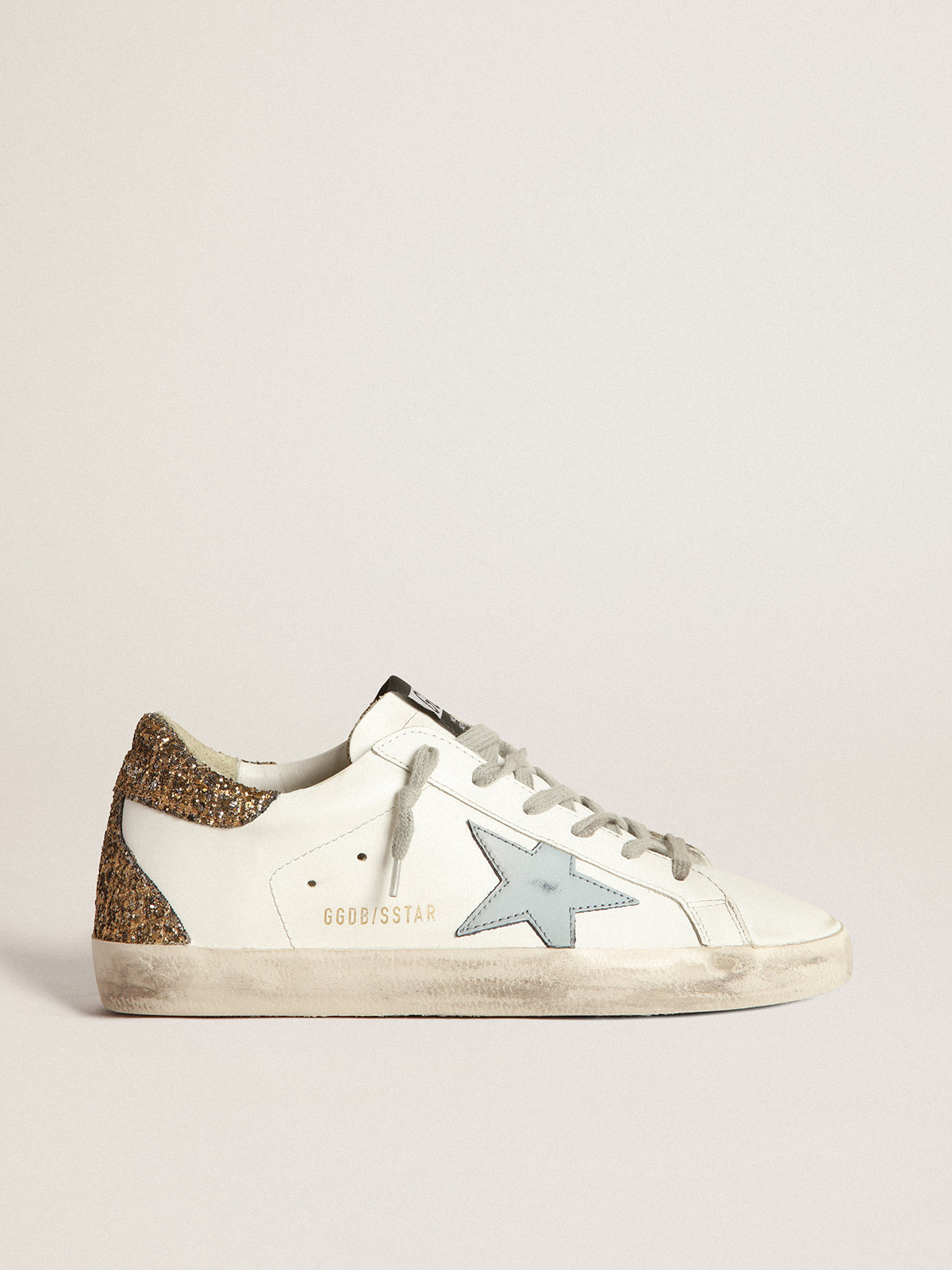 Super-Star sneakers with light blue leather star and gold glitter