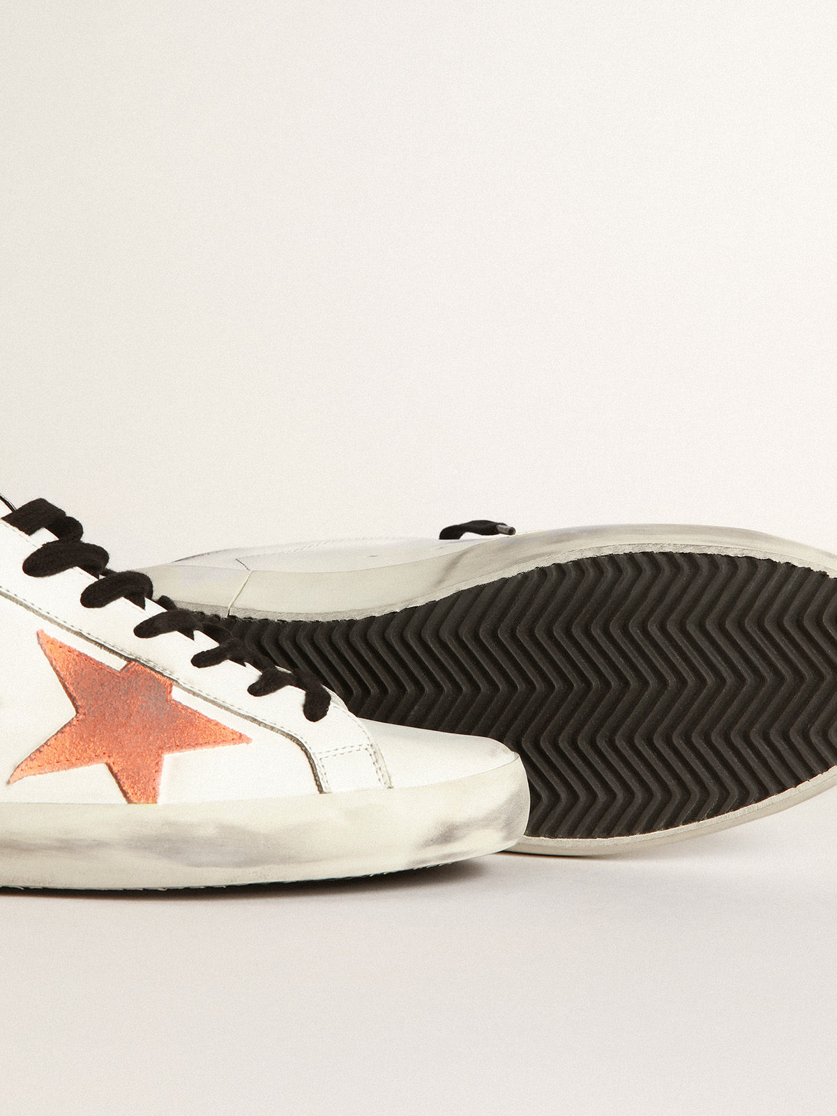 Super-Star sneakers with star and fluorescent orange heel tab | Golden Goose