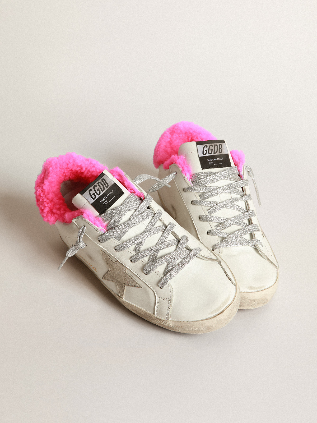Super-Star sneakers with fuchsia shearling lining and ice-gray suede star |  Golden Goose