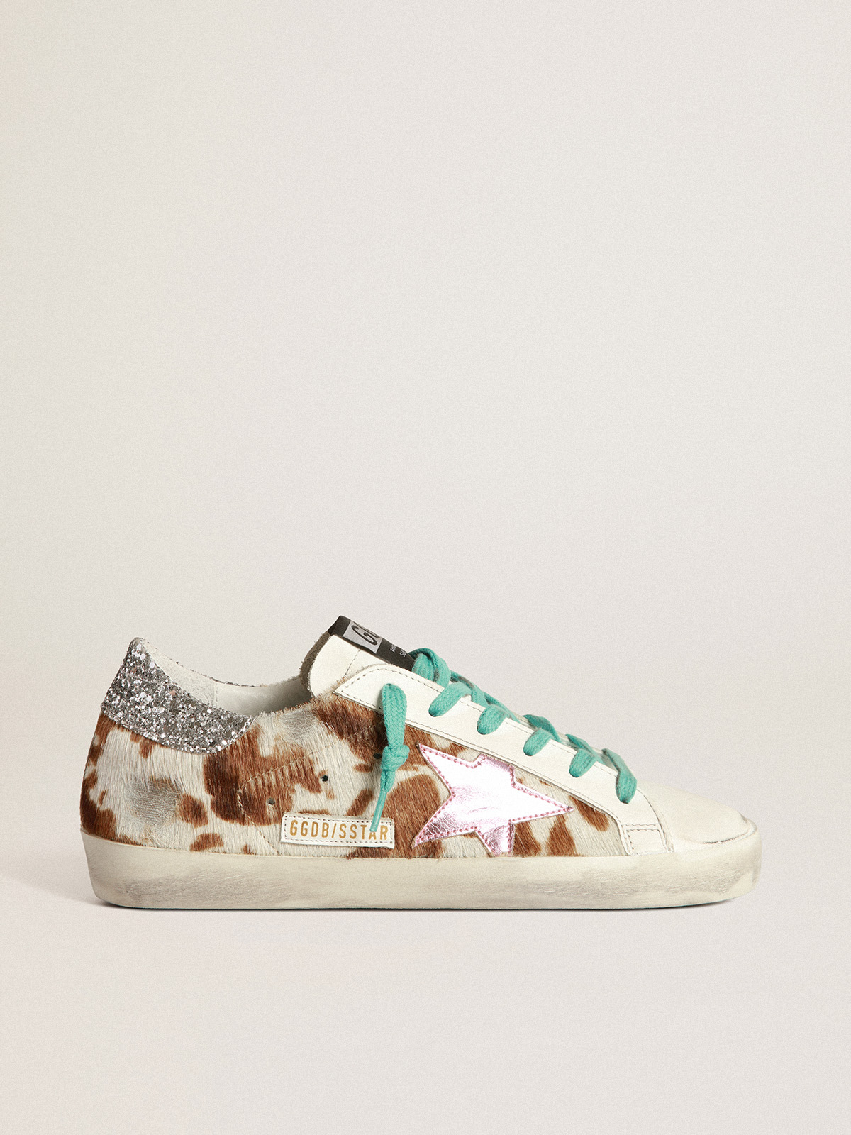 Cow-print Super-Star sneakers with glittery heel tab | Golden Goose
