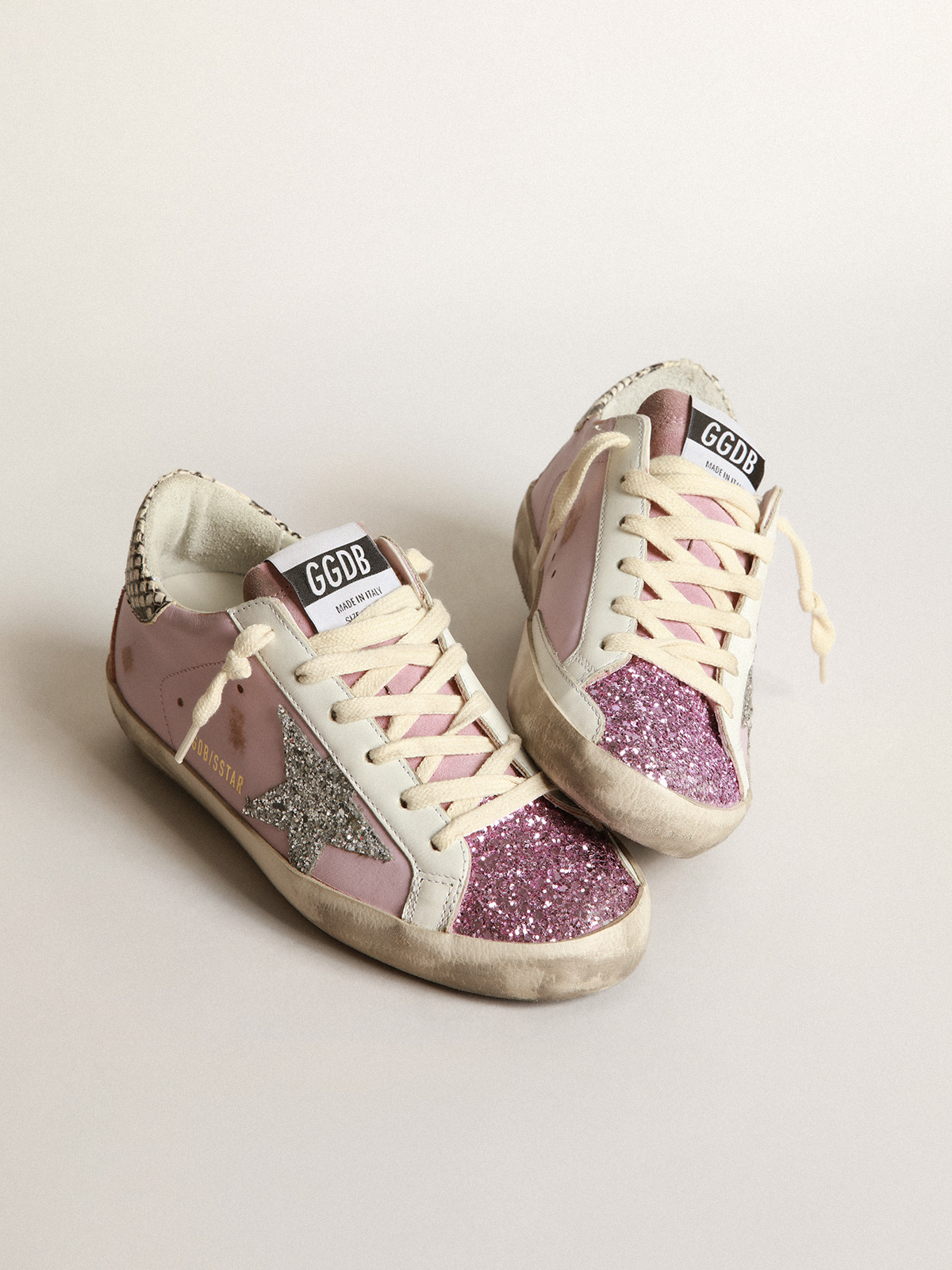 Super-Star sneakers in pink leather with silver glitter star and snake-print  leather heel tab | Golden Goose