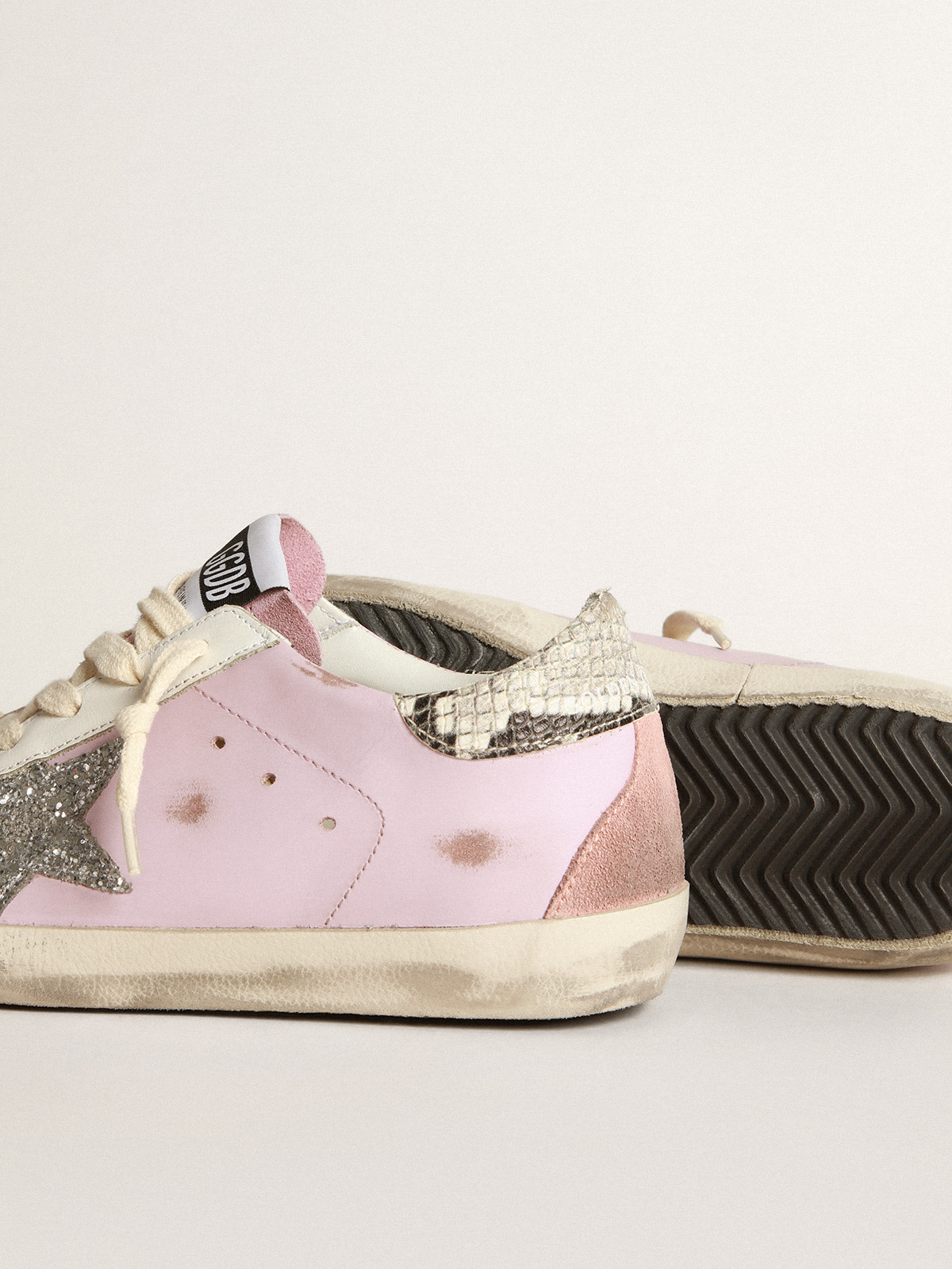 Super-Star sneakers in white leather and canvas with shocking-pink leather  star and silver glitter heel tab