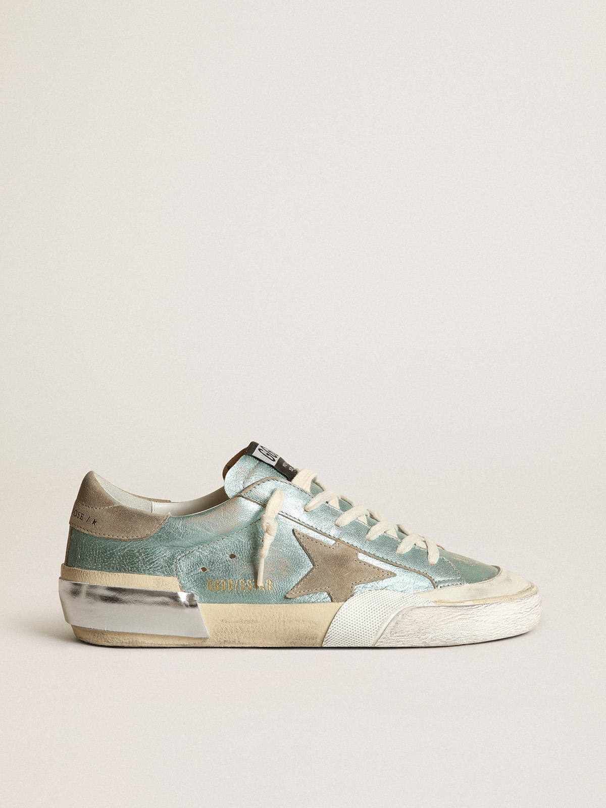 Super-Star sneakers in mint-green laminated leather with star and multi-foxing | Golden