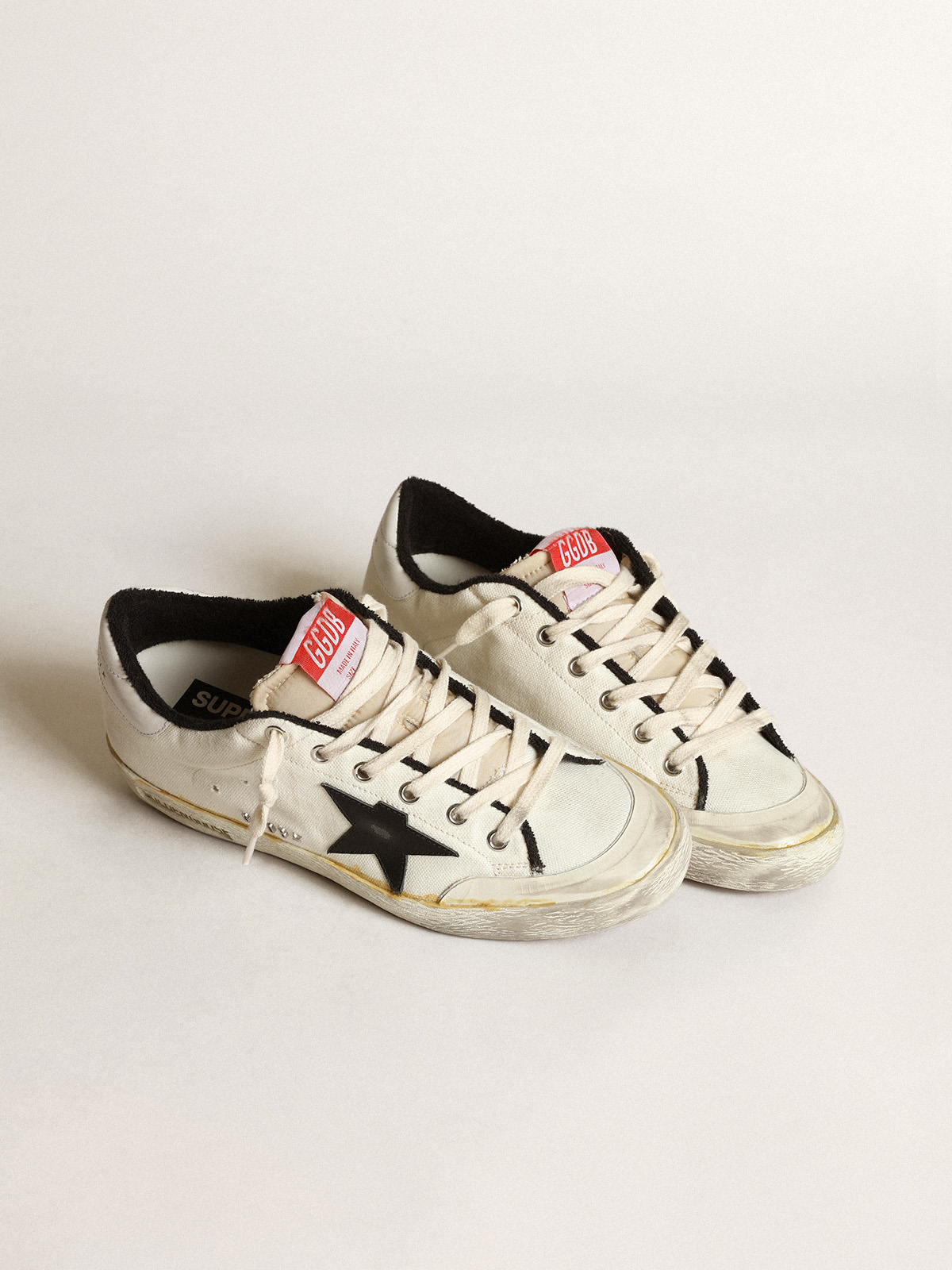 Women's Super-Star LTD in beige canvas with black star | Golden Goose