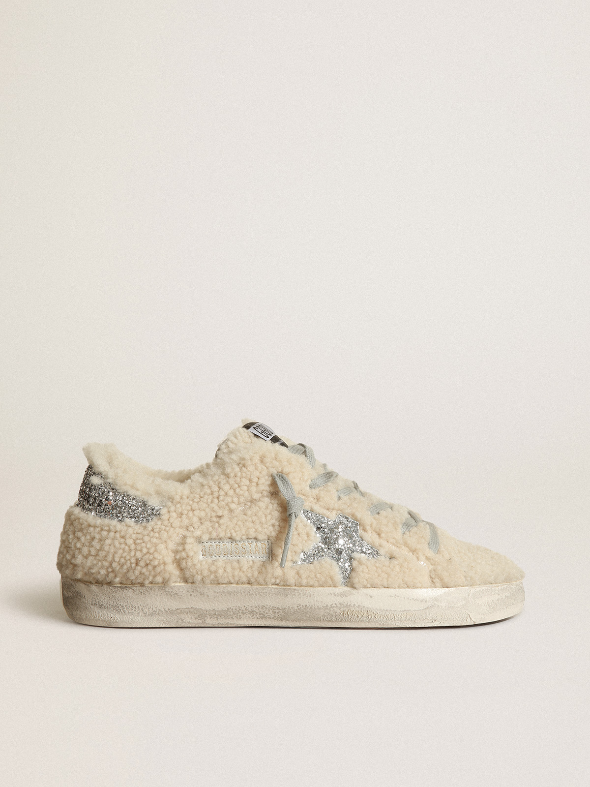 Super-Star sneakers in beige shearling with silver glitter star and heel  tab | Golden Goose