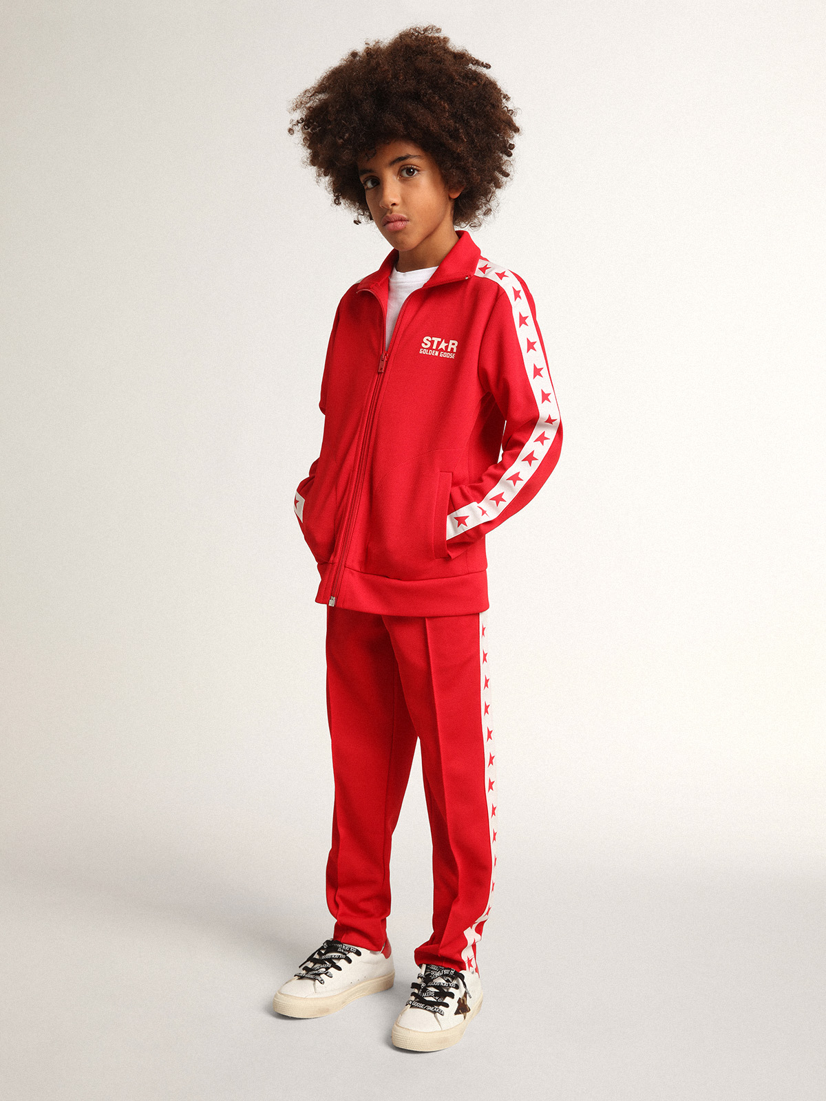 Red joggers best sale with white stripe