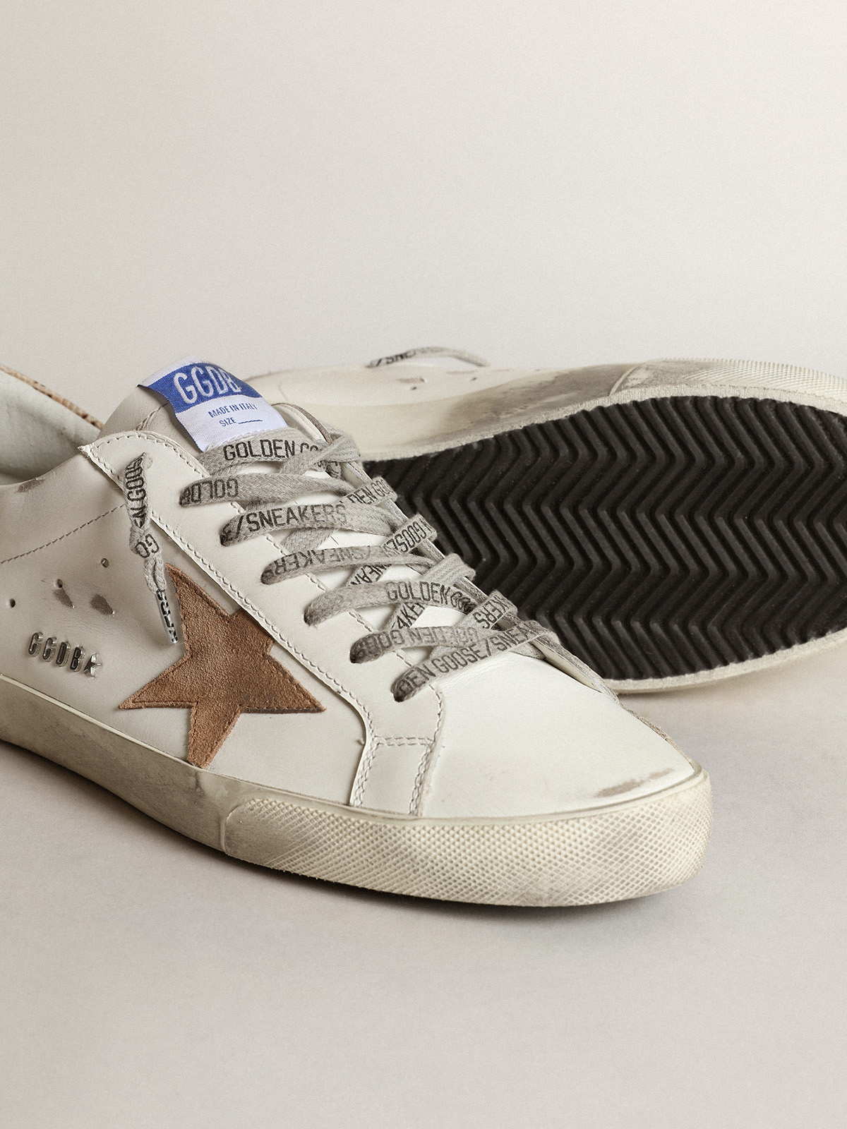 Super-Star with a tobacco suede star and beige heel tab | Golden Goose