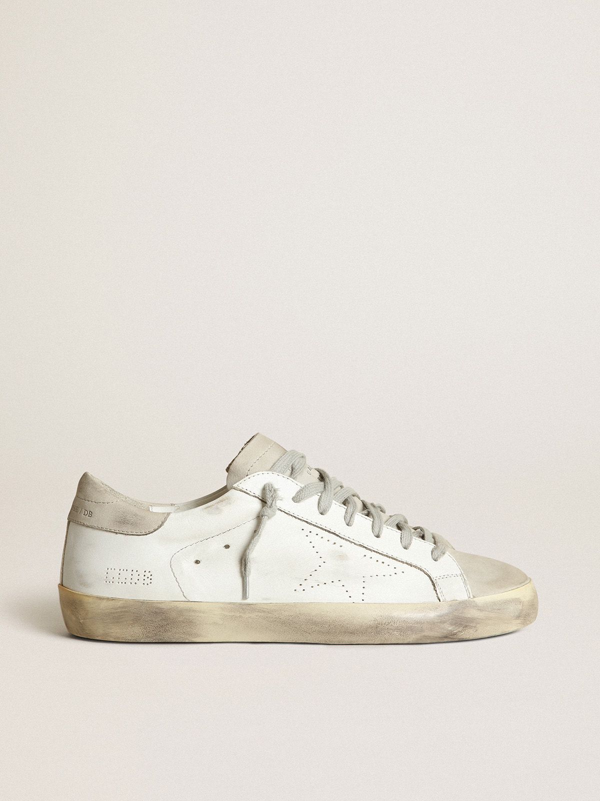 Sneakers super star in pelle e store stella traforata