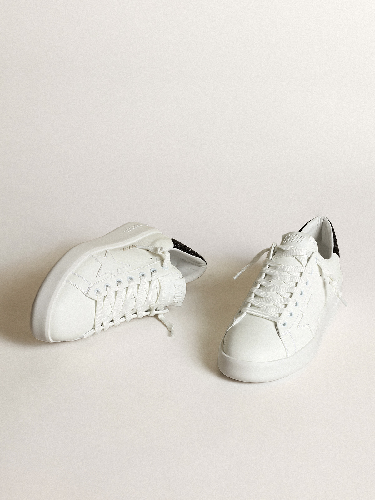 Purestar in white leather with tone-on-tone star and heel tab in black Swarovski  crystals | Golden Goose