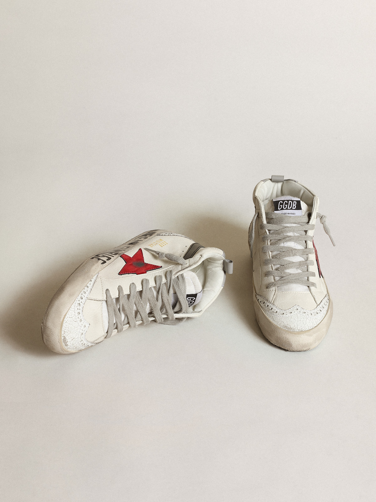 Mid Star with a pink laminated leather star and black flash | Golden Goose