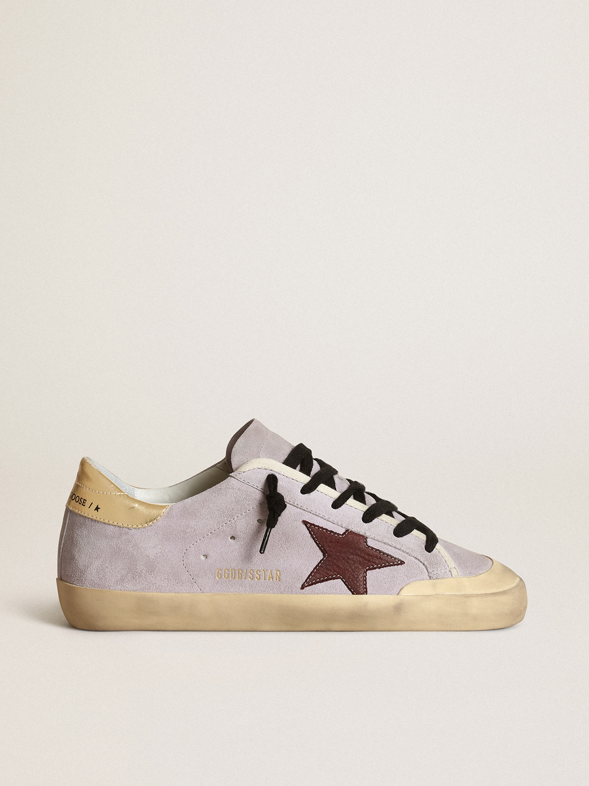 Super Star in lilac suede with a brown star and gold heel tab