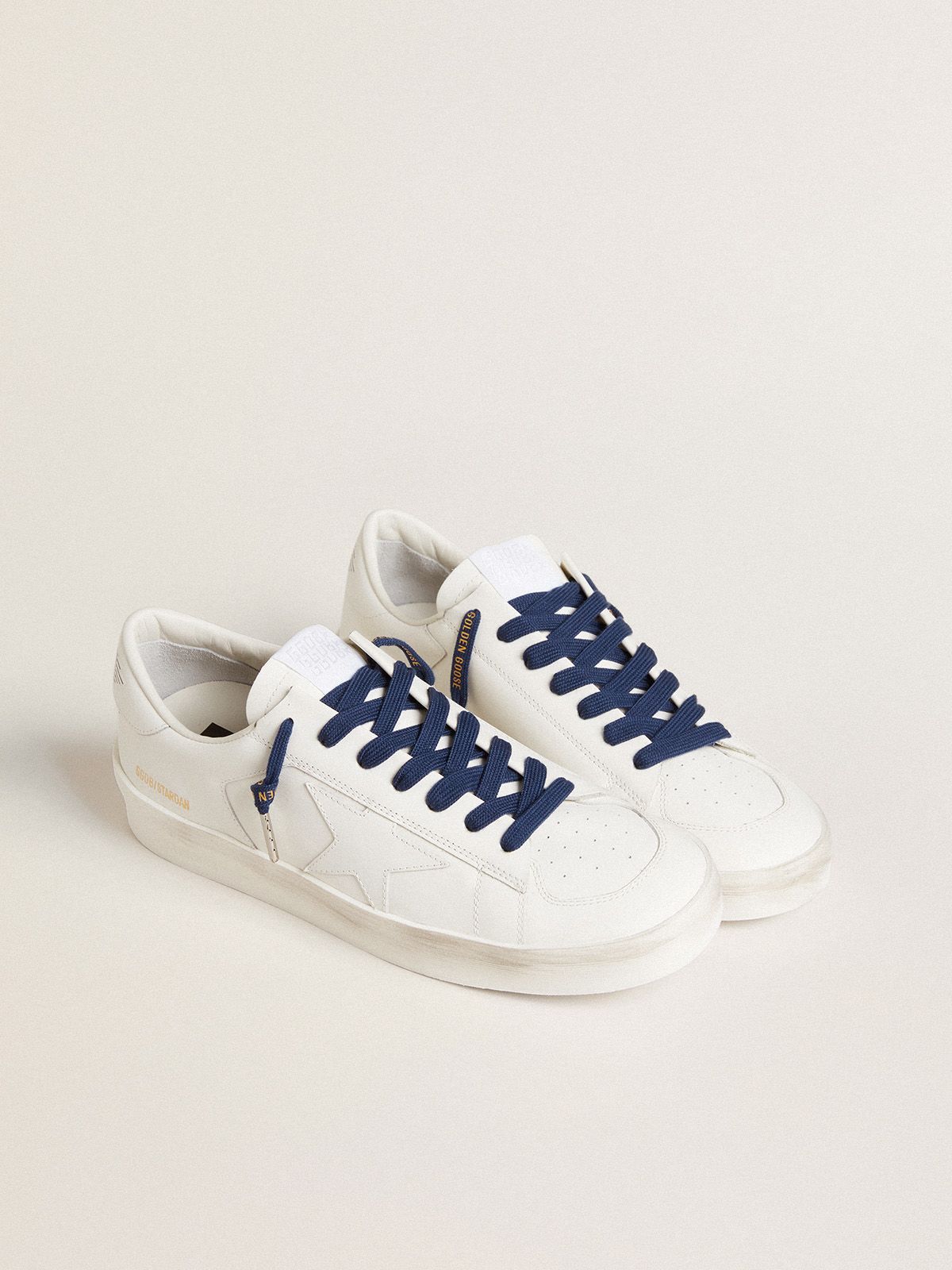 Navy-blue cotton laces with contrasting gold-colored logo | Golden