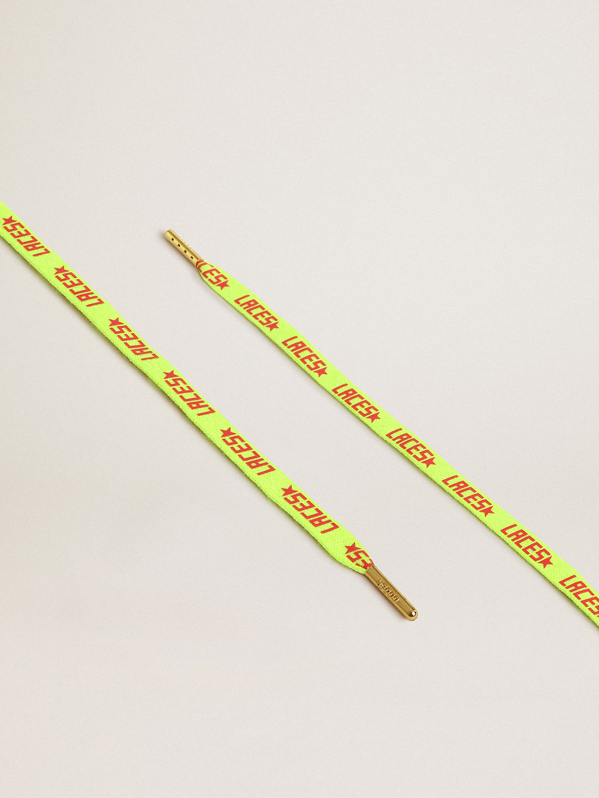 Fluorescent yellow laces with contrasting orange 'Laces' lettering