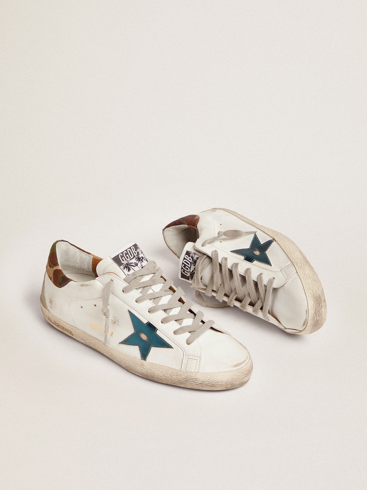 Super-Star sneakers with petrol-blue metallic leather star and 