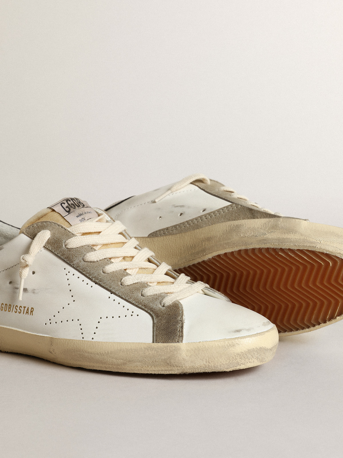 Men's Super-Star with perforated star and blue heel tab | Golden Goose