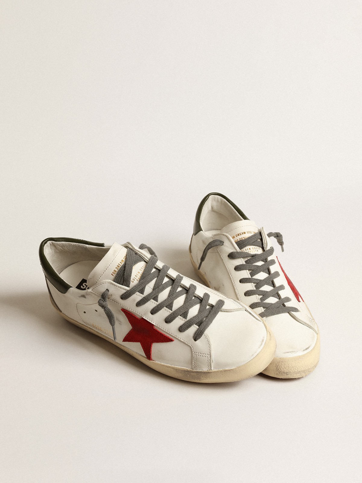 Men's Super-Star with red suede star and green leather heel tab