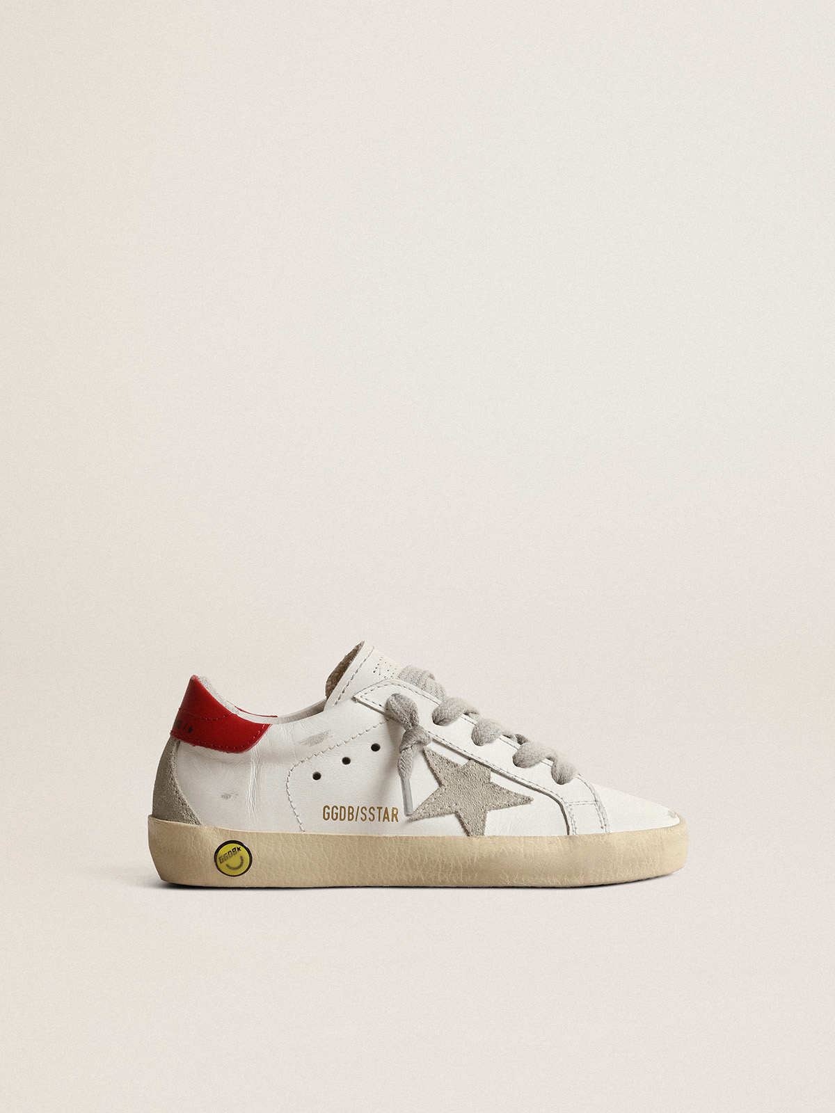 Super-Star Young with suede star and red leather heel tab | Golden