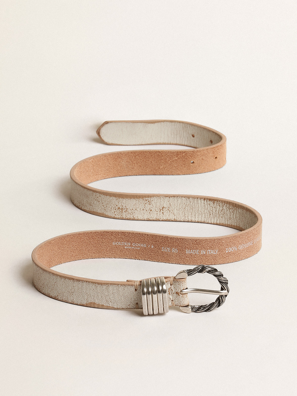 White and beige belt with silver colored braided buckle