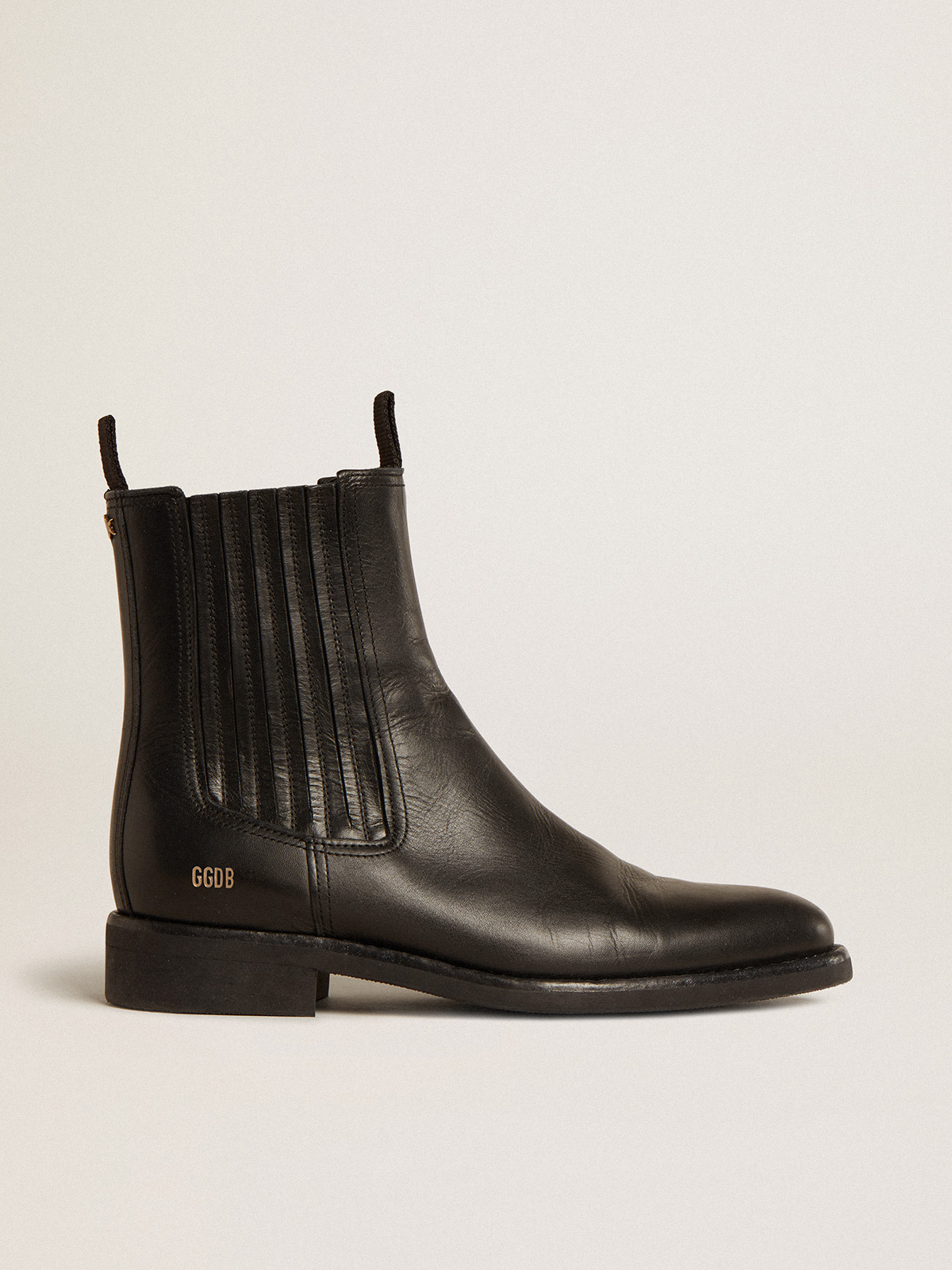 Black and shop gold chelsea boots