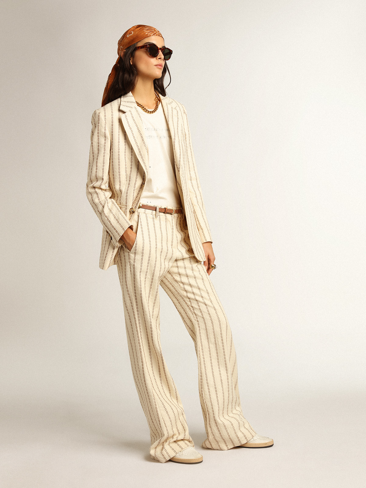 Cream-colored cotton pants with jacquard motif | Golden Goose