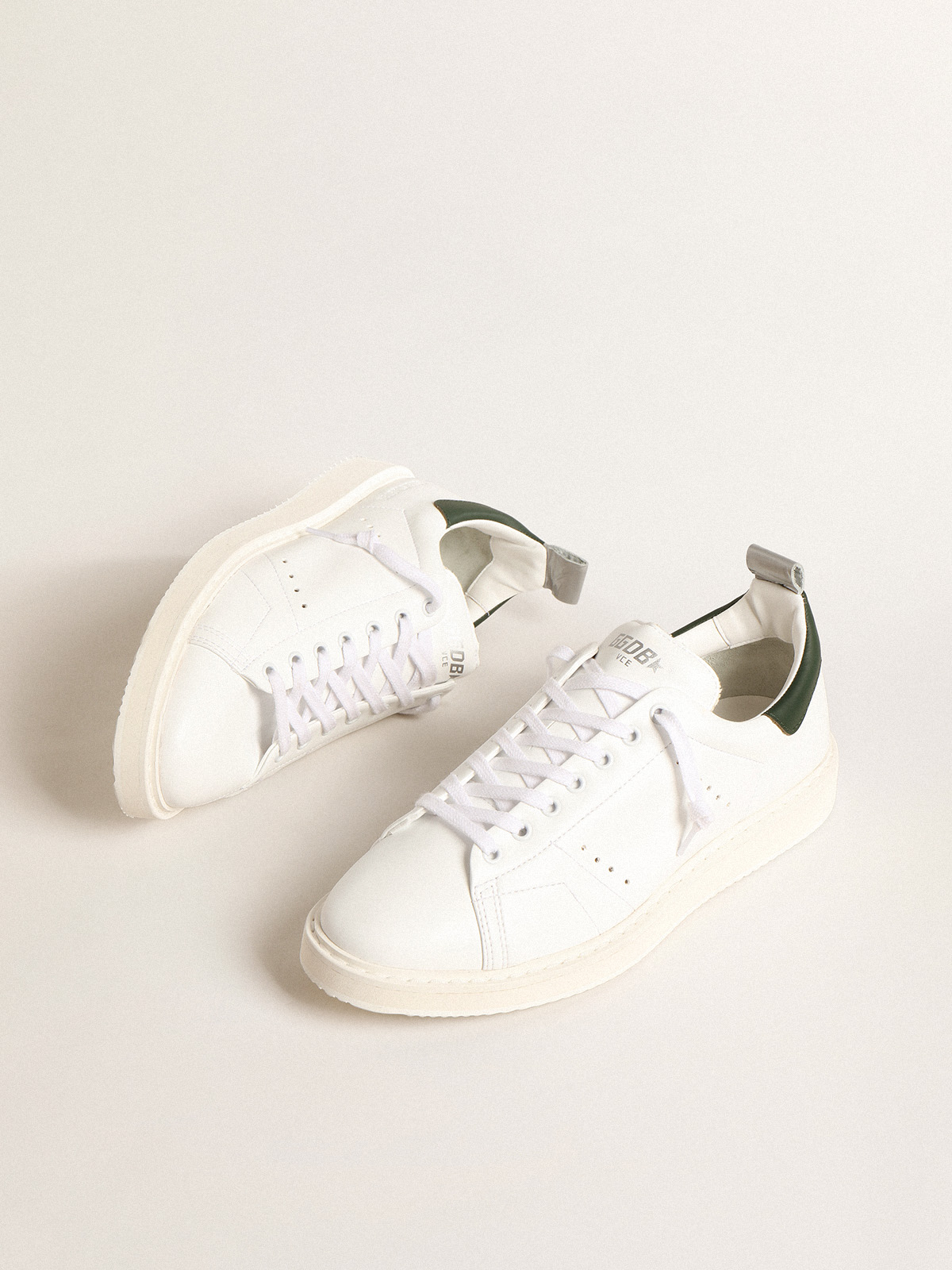 Starter bio based con talloncino in pelle verde Golden Goose