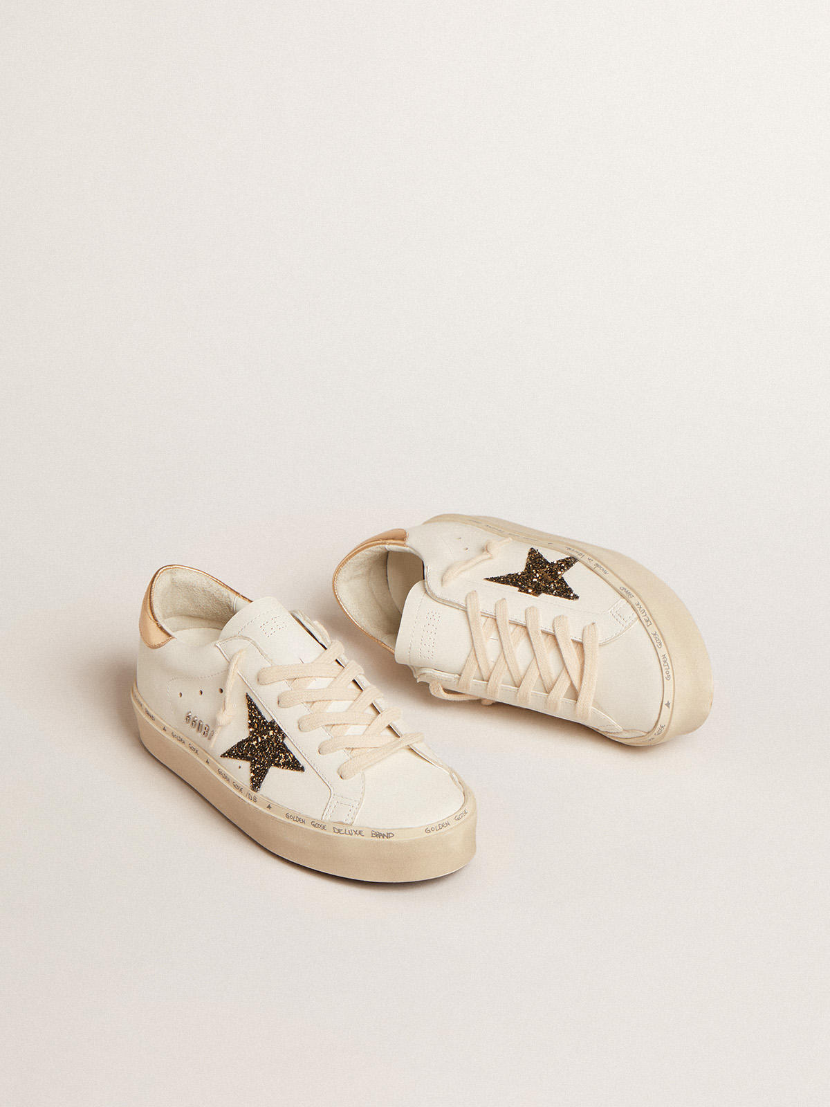 Hi Star LTD with black and gold glitter star and gold heel tab