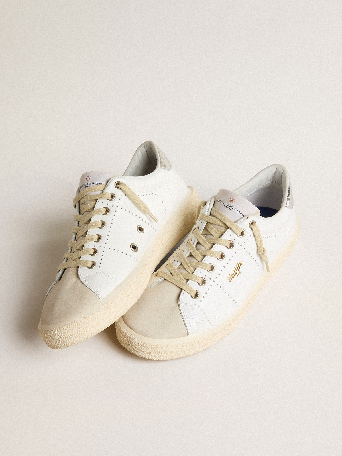 Golden goose store tennis sneakers