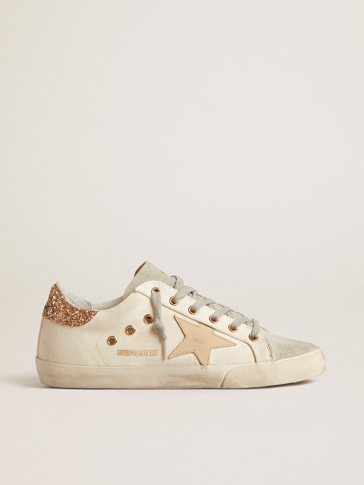 Super-Star LTD in canvas with sand star and glitter heel tab | Golden Goose