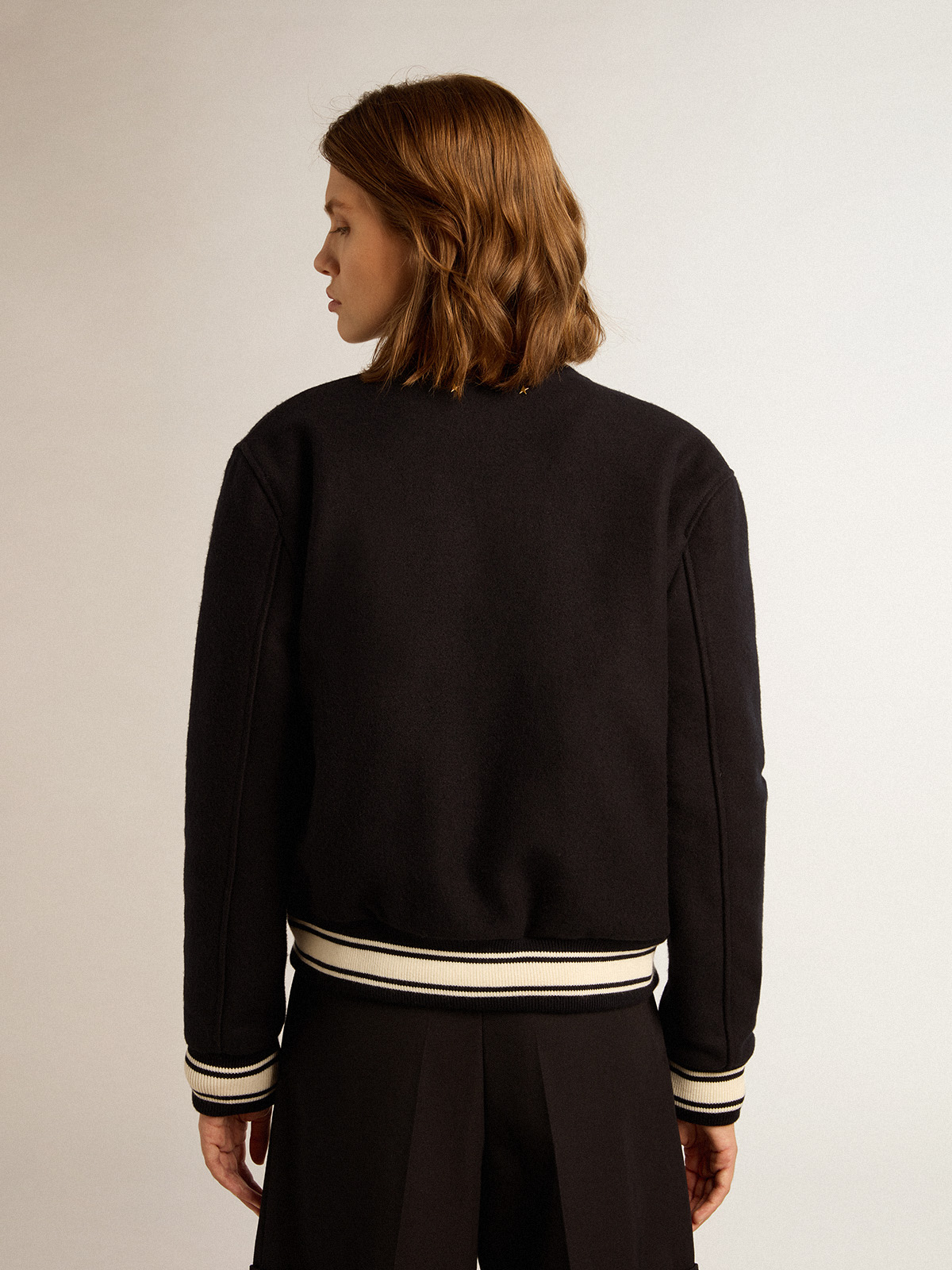 Women's bomber jacket in dark blue wool with white details