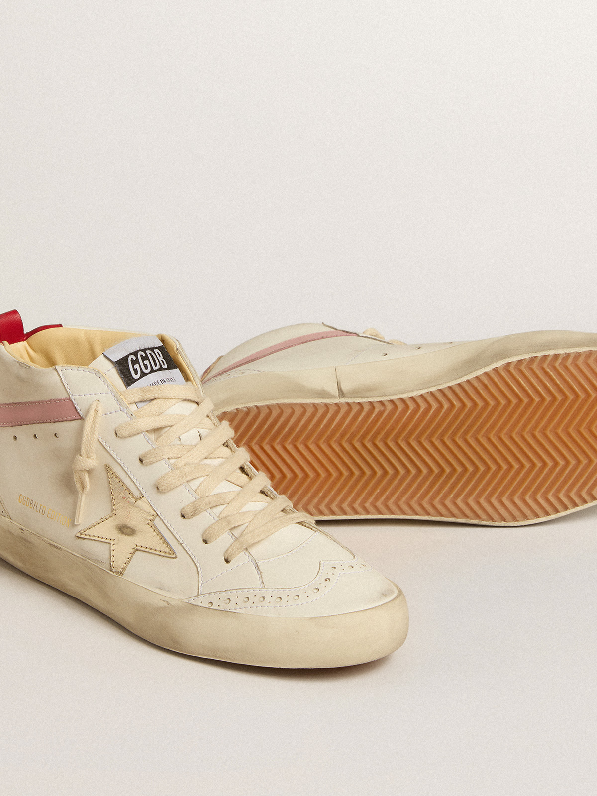 Bio-based Mid Star LTD with gold leather star and pink flash | Golden Goose