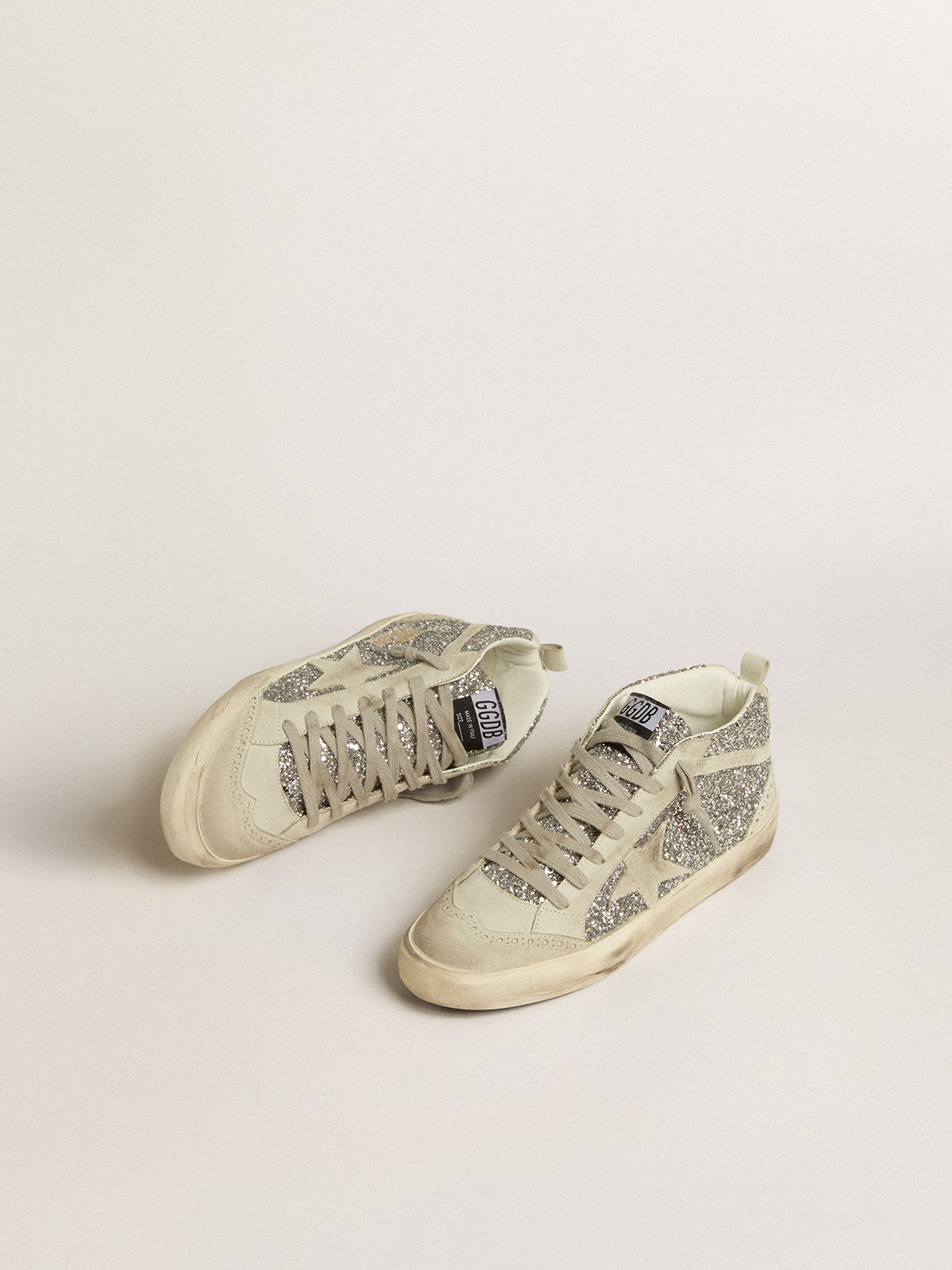 Golden goose silver glitter mid best sale star sneakers