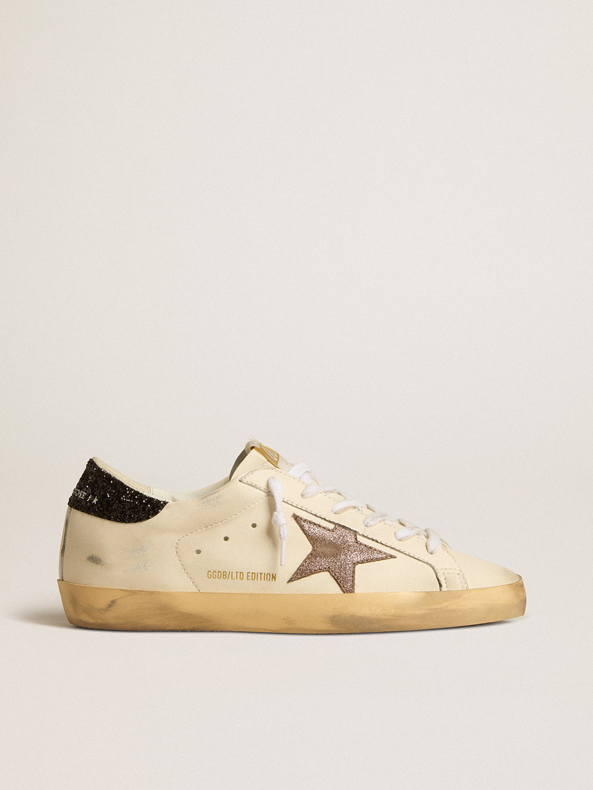 Super-Star LTD with laminated leather star and black glitter heel tab |  Golden Goose