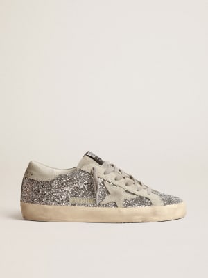 Super-Star sneakers in gold glitter with fluorescent pink suede star |  Golden Goose