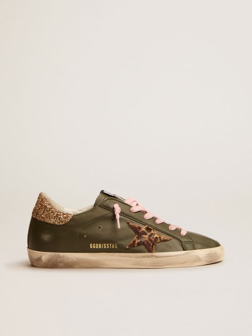 Super-Star sneakers in dark green leather with gold glitter heel tab |  Golden Goose