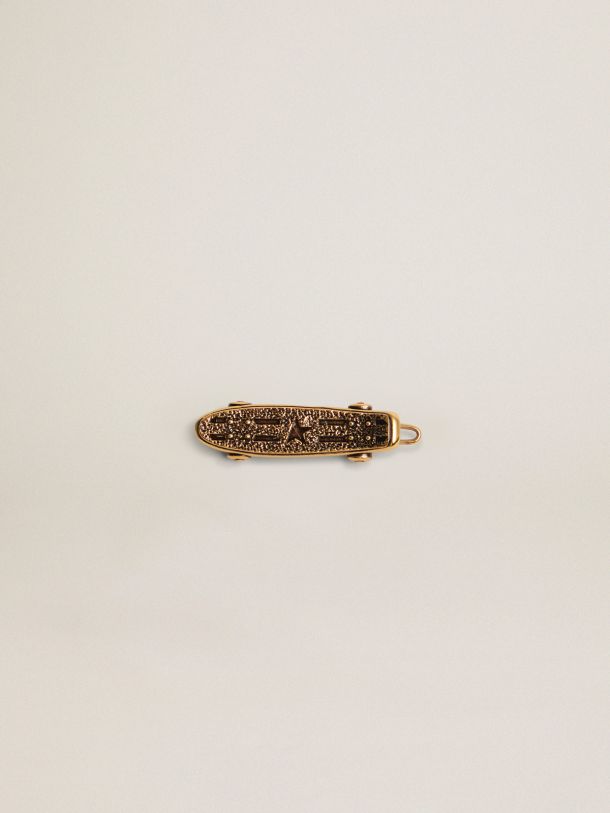 Golden Goose - Accesorio para cordones Timeless de la colección Jewelmates en color oro antiguo con forma de monopatín in 
