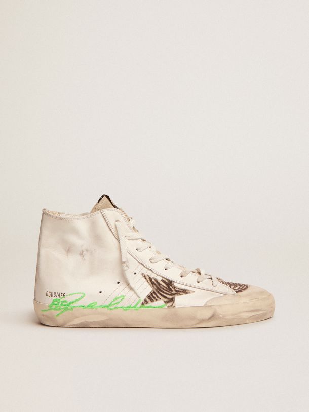 Sneakers Francy Penstar LTD en cuir blanc avec étoile en cuir façon poulain zébré et logo à paillettes vertes