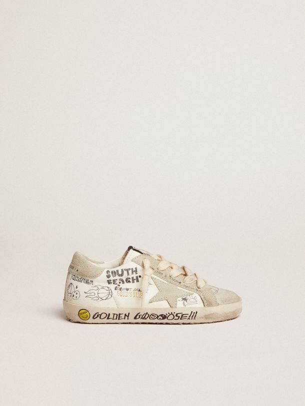 Golden Goose - Super-Star sneakers with ice-gray suede inserts and all-over black lettering in 