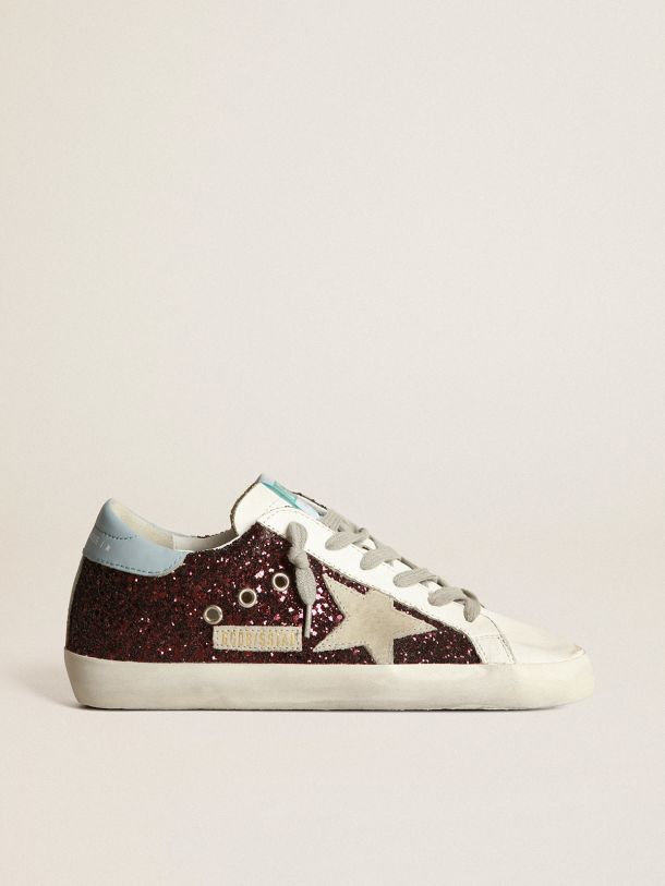 Golden Goose - Super-Star sneakers in burgundy glitter with ice-gray suede star and light blue leather heel tab in 