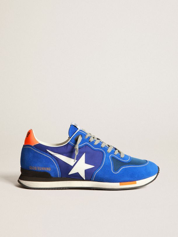 饰有白色星星图案的荧光蓝色 Running 运动鞋