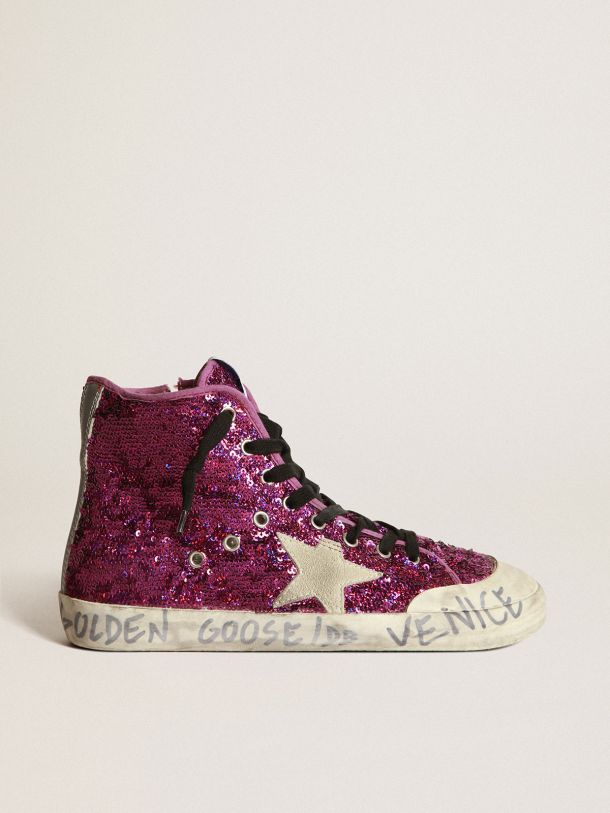 Francy sneakers with sequins and handwritten lettering on the outsole