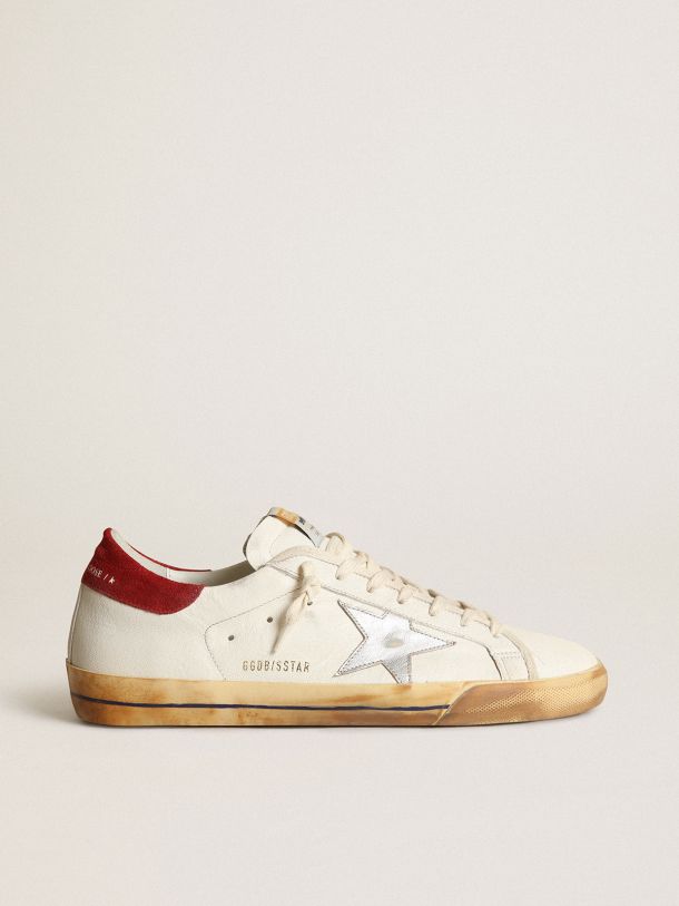 Super-Star sneakers with silver metallic leather star and red suede heel tab