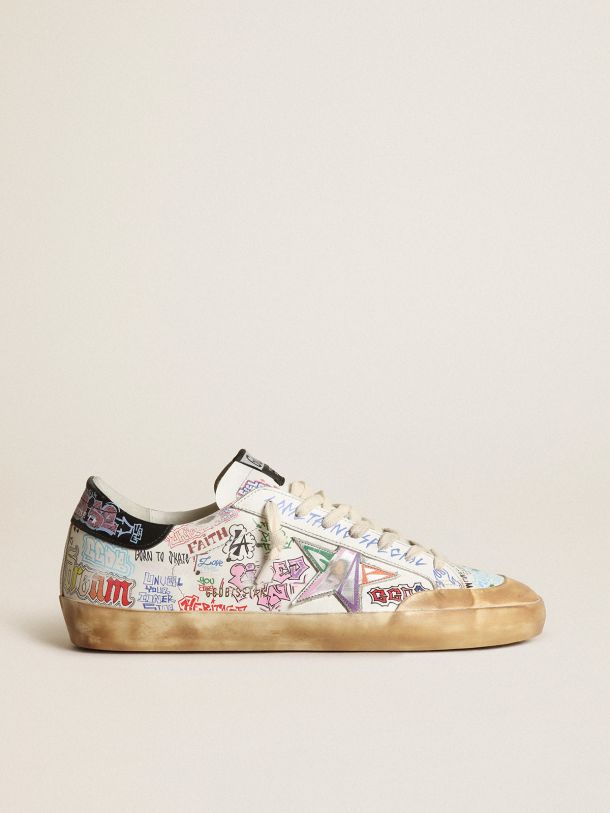 Golden Goose - Men’s Super-Star Penstar sneakers in white leather with all-over multicolored lettering in 