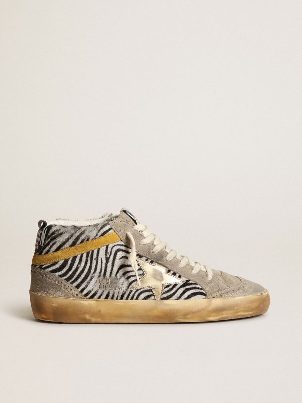 Golden Goose - Mid Star sneakers in zebra-print pony skin with gold metallic leather star and mustard-colored suede flash in 