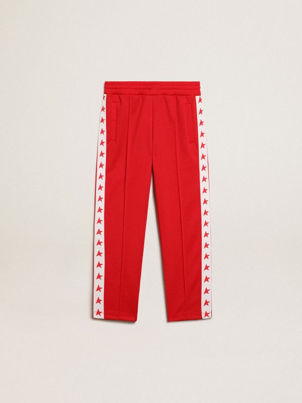 Red joggers with white stripe with contrasting red stars