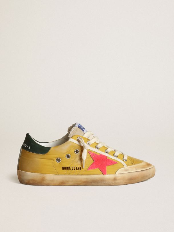 Golden Goose - Super-Star Penstar sneakers in mustard-colored nylon with fluorescent lobster-colored suede star in 